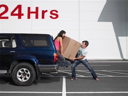 Couple Loading Box into Truck Stock Photo - Rights-Managed, Code: 700-00644039