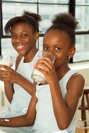 simsearch:700-00033360,k - Portrait of Sisters Drinking Milk Stock Photo - Rights-Managed, Code: 700-00641039