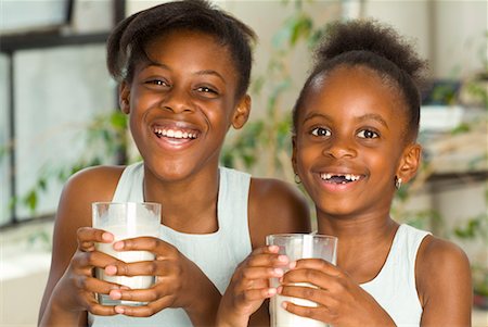 simsearch:700-00033360,k - Portrait of Sisters Drinking Milk Stock Photo - Rights-Managed, Code: 700-00641040