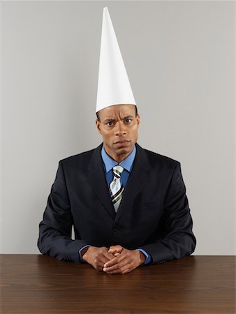 simsearch:700-00078438,k - Businessman Wearing a Dunce Cap Stock Photo - Rights-Managed, Code: 700-00659463
