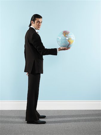 Portrait of Businessman Holding Globe Stock Photo - Rights-Managed, Code: 700-00659491