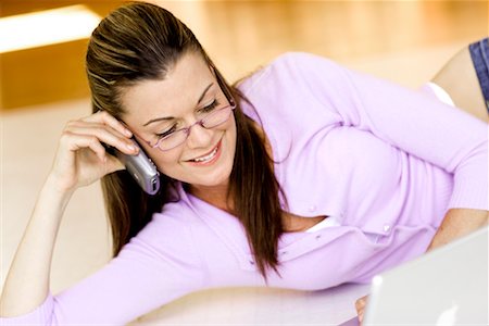 simsearch:700-00910445,k - Woman Using Laptop and Cell Phone Stock Photo - Rights-Managed, Code: 700-00651222