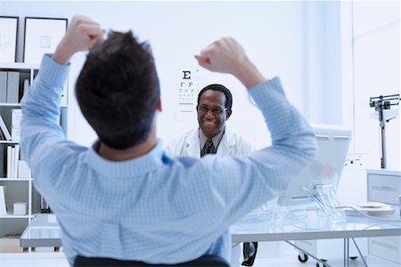 simsearch:700-00616627,k - Patient Cheering in Doctor's Office Stock Photo - Rights-Managed, Code: 700-00661005