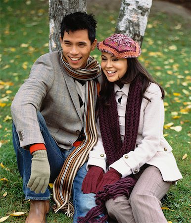 simsearch:700-00529622,k - Couple Sitting on Grass Stock Photo - Rights-Managed, Code: 700-00661070
