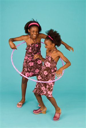 simsearch:700-00033360,k - Sisters Playing with Hula-Hoop Stock Photo - Rights-Managed, Code: 700-00661375
