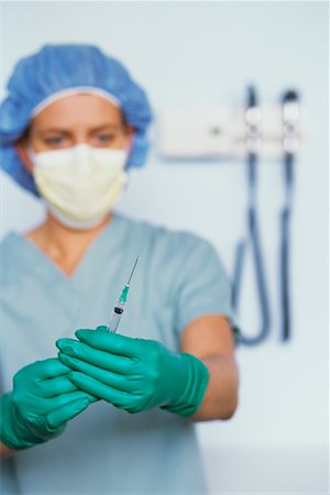simsearch:600-02912811,k - Doctor Holding Syringe Stock Photo - Rights-Managed, Code: 700-00678860