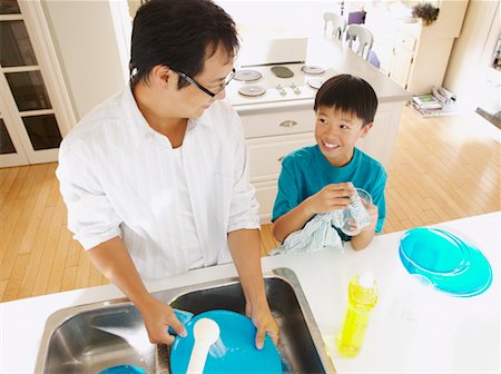 Man and Boy Washing Dishes Stock Photo - Rights-Managed, Code: 700-00686843