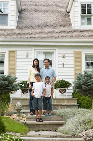 simsearch:700-00041478,k - Portrait of Family in Front of Home Stock Photo - Rights-Managed, Code: 700-00686869