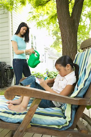 simsearch:700-01716701,k - Mother and Daughter on House Patio Stock Photo - Rights-Managed, Code: 700-00686883