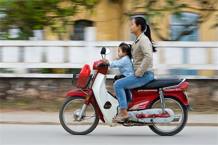simsearch:700-01716701,k - Woman and Child on Motorcycle, Luang Prabang, Laos Stock Photo - Rights-Managed, Code: 700-00688128