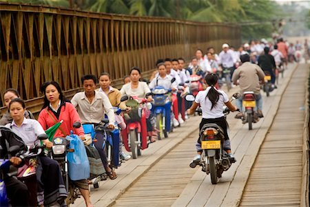 simsearch:700-00189342,k - People on Scooters Crossing Bridge Over the Nam Khan River, Luang Prabang, Laos Stock Photo - Rights-Managed, Code: 700-00688139