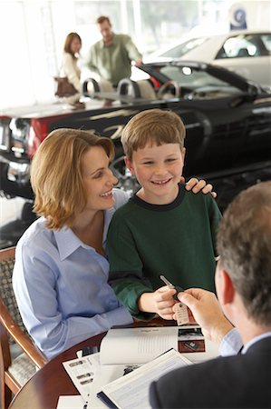 family car dealer - Woman Buying a Car Stock Photo - Rights-Managed, Code: 700-00688448