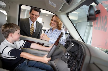 Mother and Son with Car Salesman Stock Photo - Rights-Managed, Code: 700-00688470