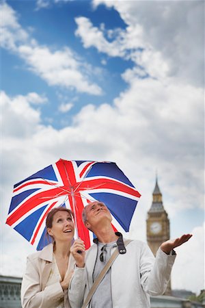 simsearch:700-00155973,k - Tourists With Union Jack Umbrella Checking For Rain, London, England Stock Photo - Rights-Managed, Code: 700-00680919