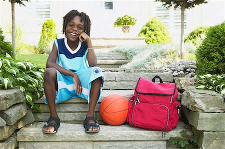 Boy Sitting On Steps Stock Photo - Rights-Managed, Code: 700-00681528