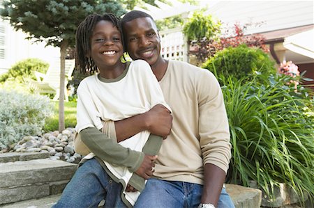 simsearch:600-01173695,k - Portrait of Father and Son Sitting On Steps Stock Photo - Rights-Managed, Code: 700-00681544