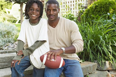 simsearch:700-00069467,k - Portrait of Father and Son Sitting On Steps Stock Photo - Rights-Managed, Code: 700-00681546