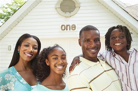 simsearch:873-06441227,k - Family Standing In Front Of Garage Stock Photo - Rights-Managed, Code: 700-00681562