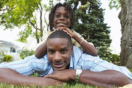 simsearch:700-00069467,k - Father and Son Lying On The Grass Stock Photo - Rights-Managed, Code: 700-00681580