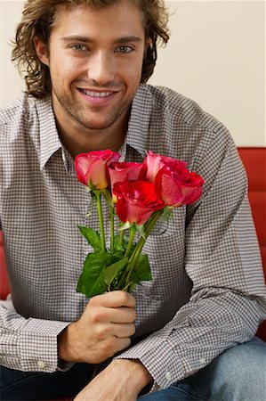 simsearch:700-00683285,k - Homme avec des fleurs Photographie de stock - Rights-Managed, Code: 700-00683232