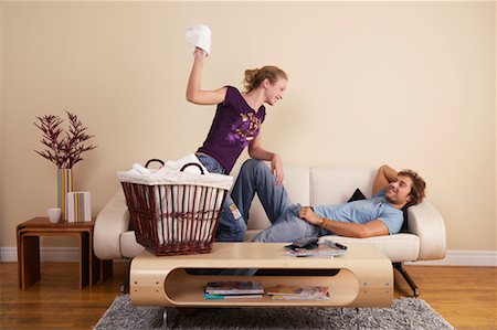 simsearch:700-00683334,k - Woman Throwing Laundry at Man Stock Photo - Rights-Managed, Code: 700-00683268