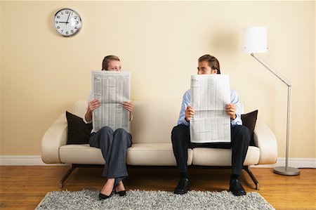 Business People Looking at Each Other Over Newspapers Stock Photo - Rights-Managed, Code: 700-00683295