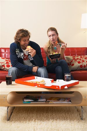 simsearch:700-00683334,k - Man Eating Pizza and Woman Eating Salad Stock Photo - Rights-Managed, Code: 700-00683314