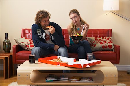 simsearch:700-00683334,k - Man Eating Pizza and Woman Eating Salad Stock Photo - Rights-Managed, Code: 700-00683313