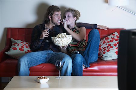 simsearch:700-00683334,k - Couple Watching Television and Eating Popcorn Stock Photo - Rights-Managed, Code: 700-00683329