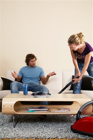 simsearch:700-00683334,k - Man Annoyed with Woman Vacuuming Stock Photo - Rights-Managed, Code: 700-00683334