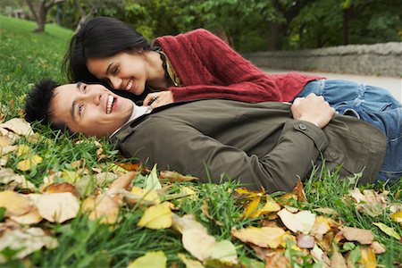 simsearch:700-03814393,k - Couple Lying in Grass Stock Photo - Rights-Managed, Code: 700-00683421