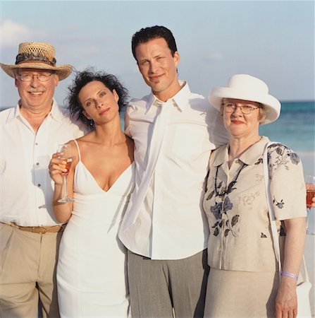 Bride and Groom with Parents on Beach Stock Photo - Rights-Managed, Code: 700-00695680