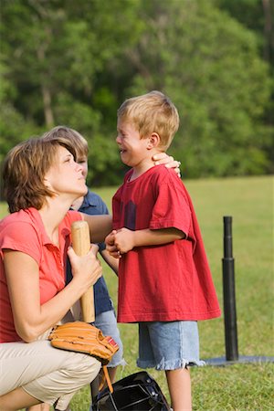 Mother Comforting Son Stock Photo - Rights-Managed, Code: 700-00711625
