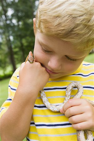 snake images for kids - Boy Holding Snake Stock Photo - Rights-Managed, Code: 700-00711638