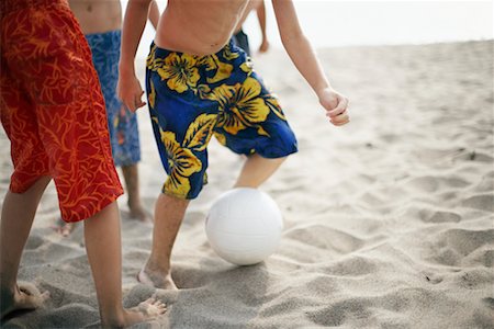 football in the backyard - Boys Playing Soccer on Beach Stock Photo - Rights-Managed, Code: 700-00748006