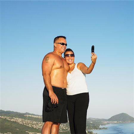 Couple Taking Picture of Themselves With Camera Phone, Diamond Head, Oahu, Hawaii Stock Photo - Rights-Managed, Code: 700-00748242