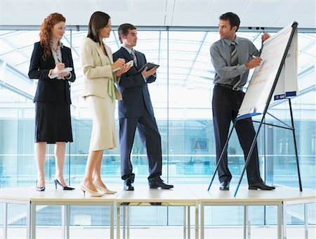 simsearch:600-05973117,k - Business Meeting on top of Boardroom Table Stock Photo - Rights-Managed, Code: 700-00748562