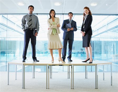 simsearch:600-01109952,k - Portrait of Business People Standing on Boardroom Table Foto de stock - Con derechos protegidos, Código: 700-00748563