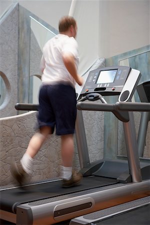 fat man exercising - Man Using Treadmill Stock Photo - Rights-Managed, Code: 700-00767946