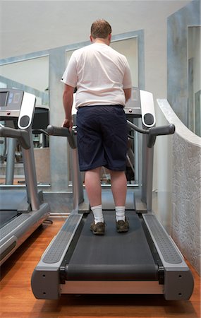 fat man exercising - Man Using Treadmill Stock Photo - Rights-Managed, Code: 700-00767943