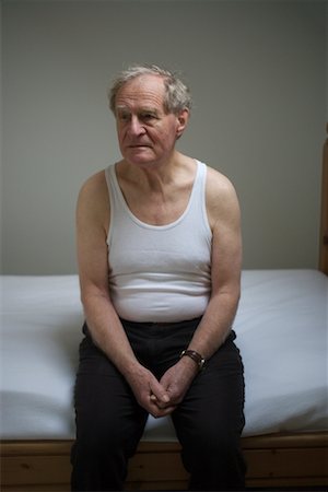 Portrait of Man on Bed Stock Photo - Rights-Managed, Code: 700-00767994