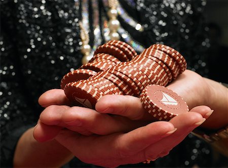 simsearch:700-00768672,k - Close Up of Woman Holding Poker Chips Stock Photo - Rights-Managed, Code: 700-00768645