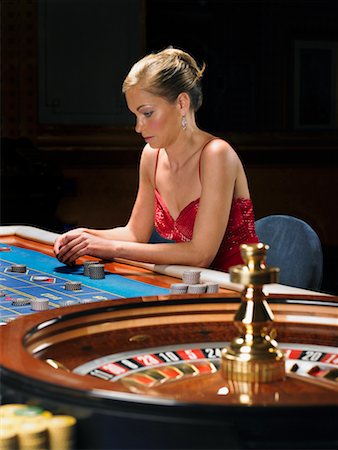 simsearch:700-00768672,k - Woman Playing Roulette Stock Photo - Rights-Managed, Code: 700-00768667