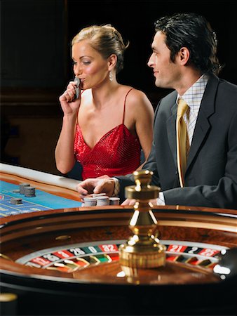 simsearch:700-00768672,k - Couple Playing Roulette Stock Photo - Rights-Managed, Code: 700-00768668