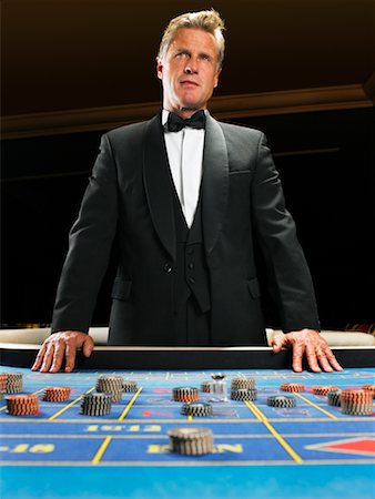 simsearch:700-00768672,k - Portrait of Croupier Stock Photo - Rights-Managed, Code: 700-00768675