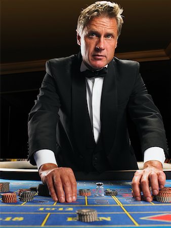 simsearch:700-00768672,k - Portrait of Croupier Stock Photo - Rights-Managed, Code: 700-00768676