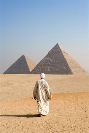 pyramids of giza close up - Man Walking Towards Pyramids, Giza, Egypt Stock Photo - Rights-Managed, Code: 700-00782209