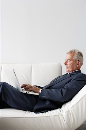 simsearch:700-03058969,k - Businessman Working on Laptop Stock Photo - Rights-Managed, Code: 700-00782240