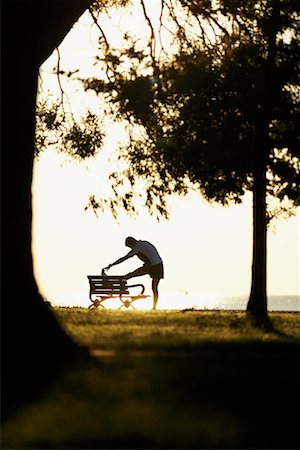 simsearch:858-03052147,k - Man Stretching on Park Bench Stock Photo - Rights-Managed, Code: 700-00782584