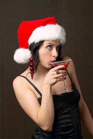 simsearch:700-00795365,k - Woman Wearing Santa Drinking a Martini Stock Photo - Rights-Managed, Code: 700-00795366